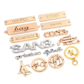 Metalen taslabels