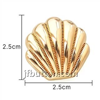 Gouden schelpvormige knoppen