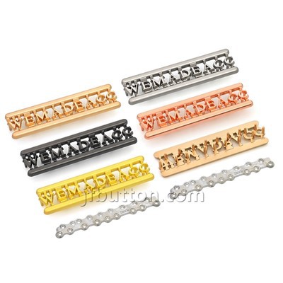 Metalen handtaslogo's